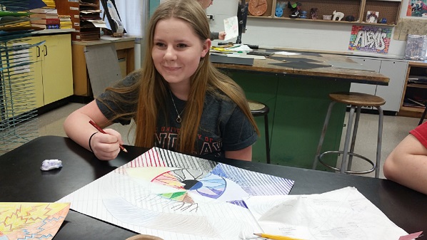 Student working on art project